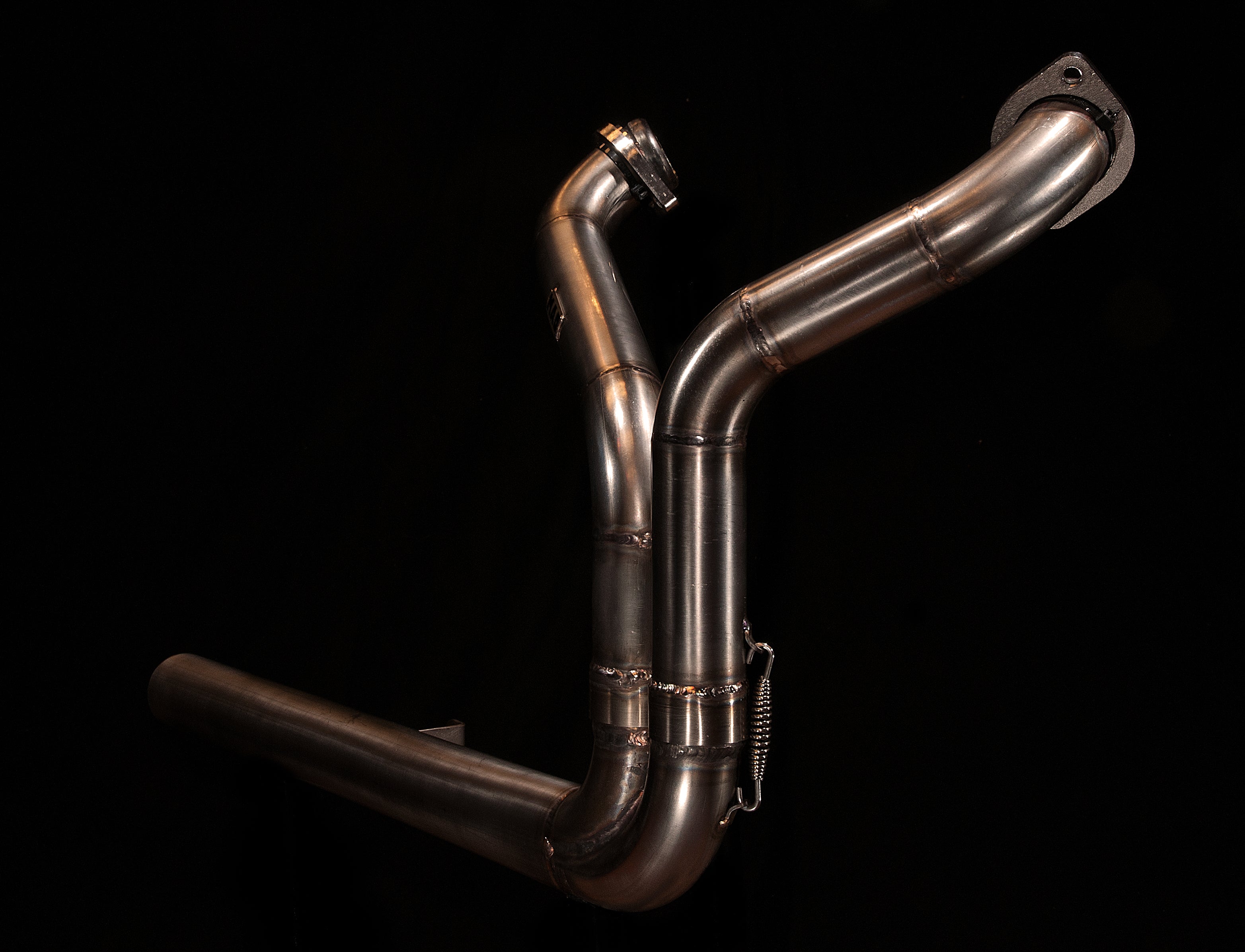 MAD Exhausts Harley-Davidson Sportster 2-in-1 header in a Y shape with both flanges and collector, studio photo on black