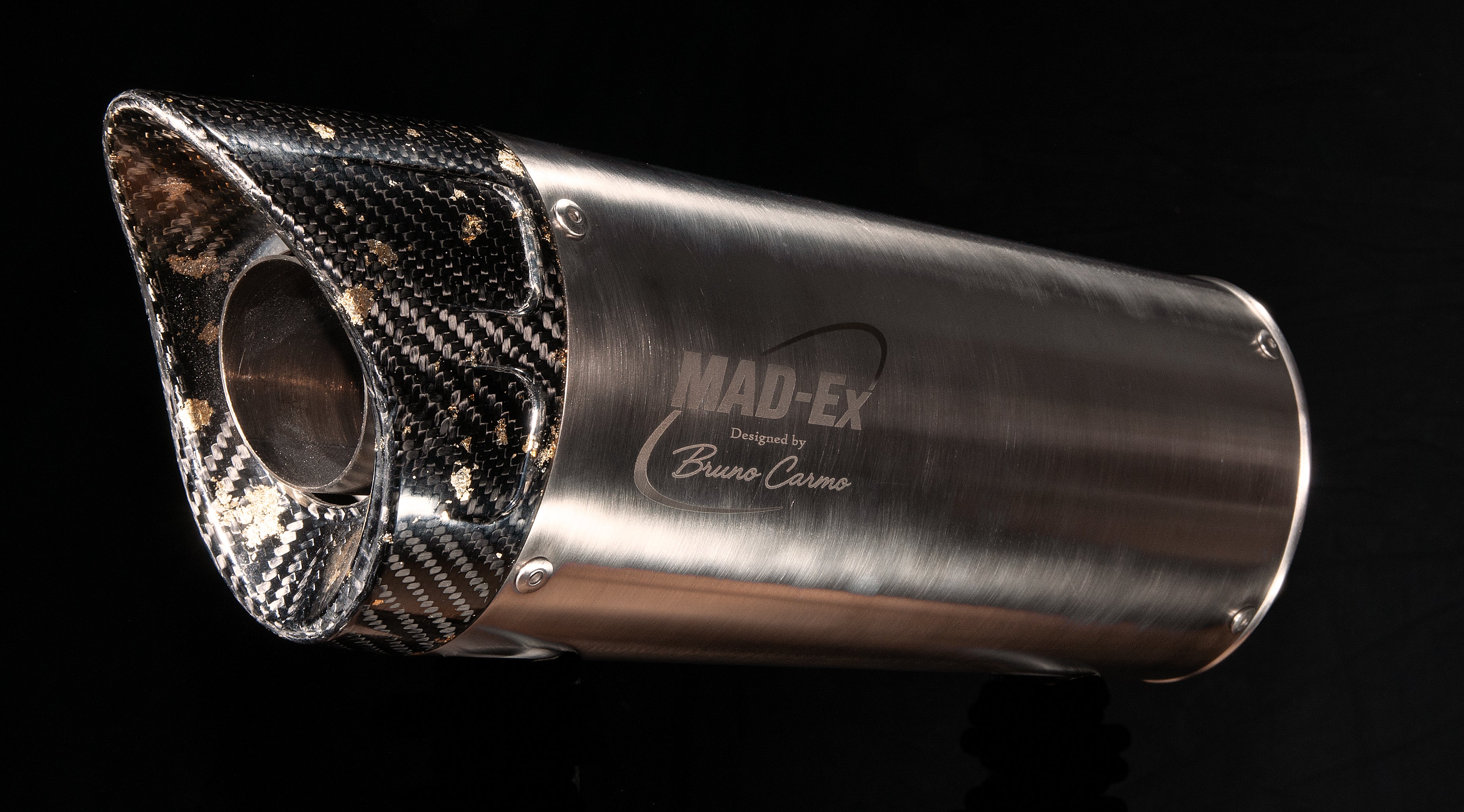 MAD-EX R1 universal race muffler in stainless steel with carbon end cap and Bruno Carmo engraving, studio photo on black