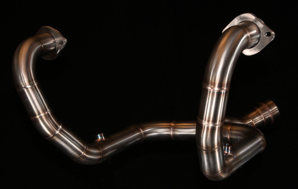 MAD Exhausts BMW R nineT 2-in-1 stainless steel header, overhead studio view showing full pipe routing and both flanges